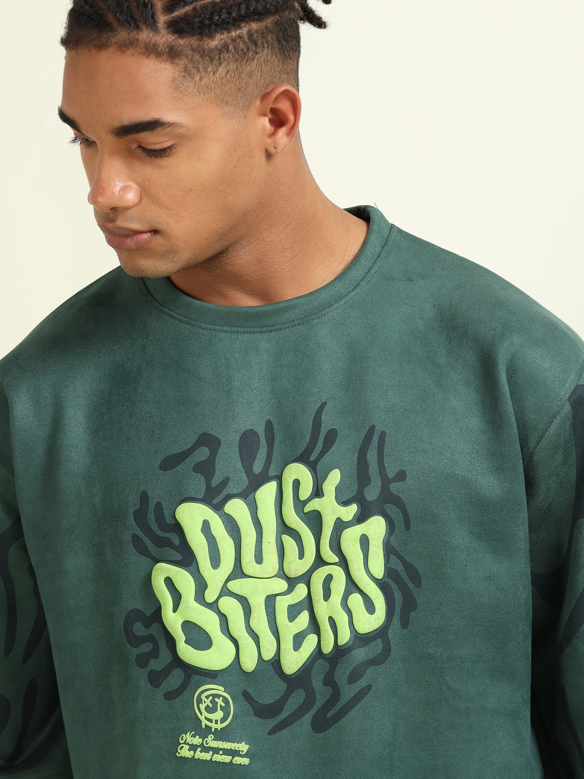 Close-up of the Dust Biters puff print design on the Green Puff Print Casual T-shirt