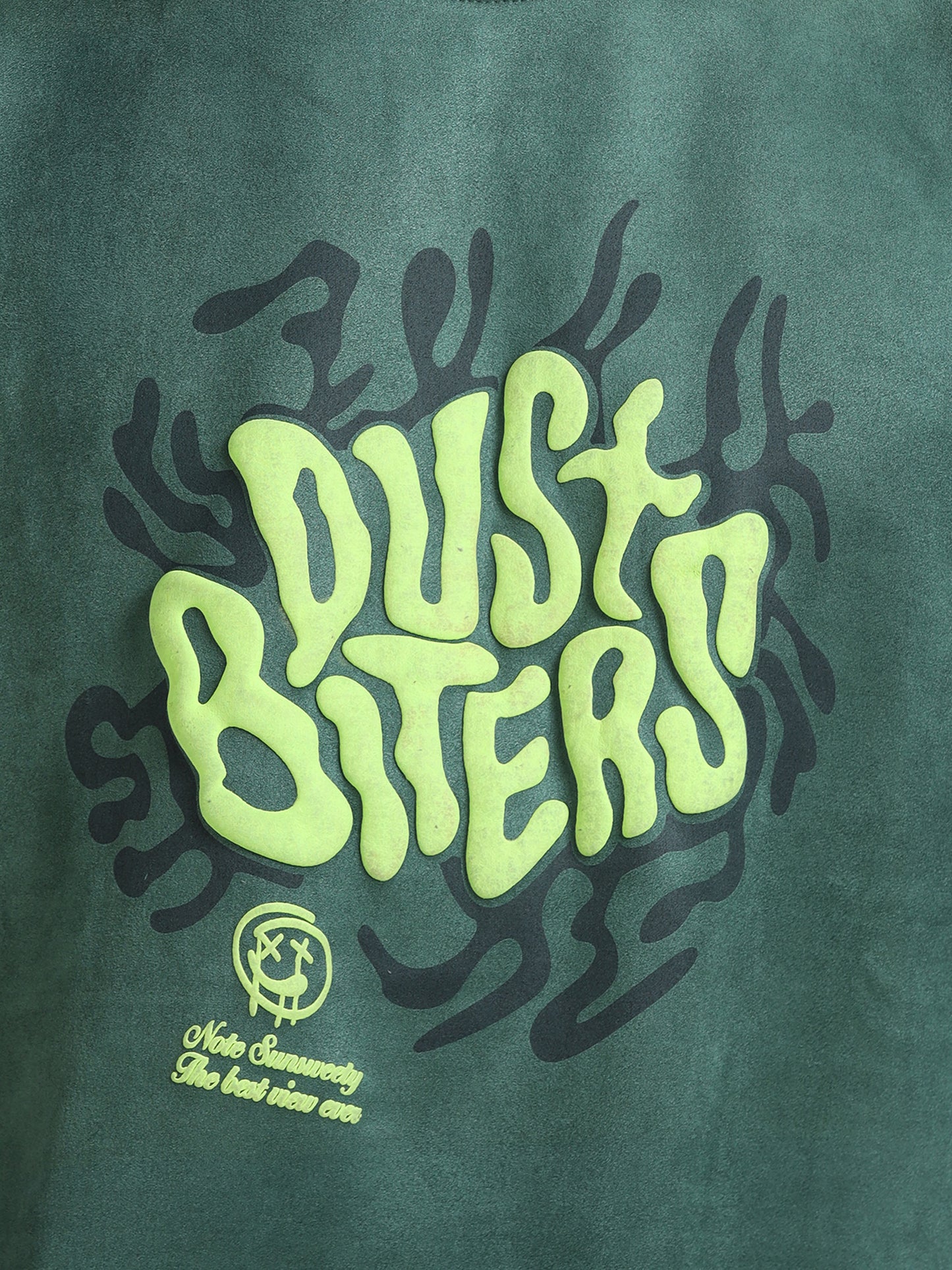 Soft-touch velvet fabric texture of the Green Puff Print Casual T-shirt in detail