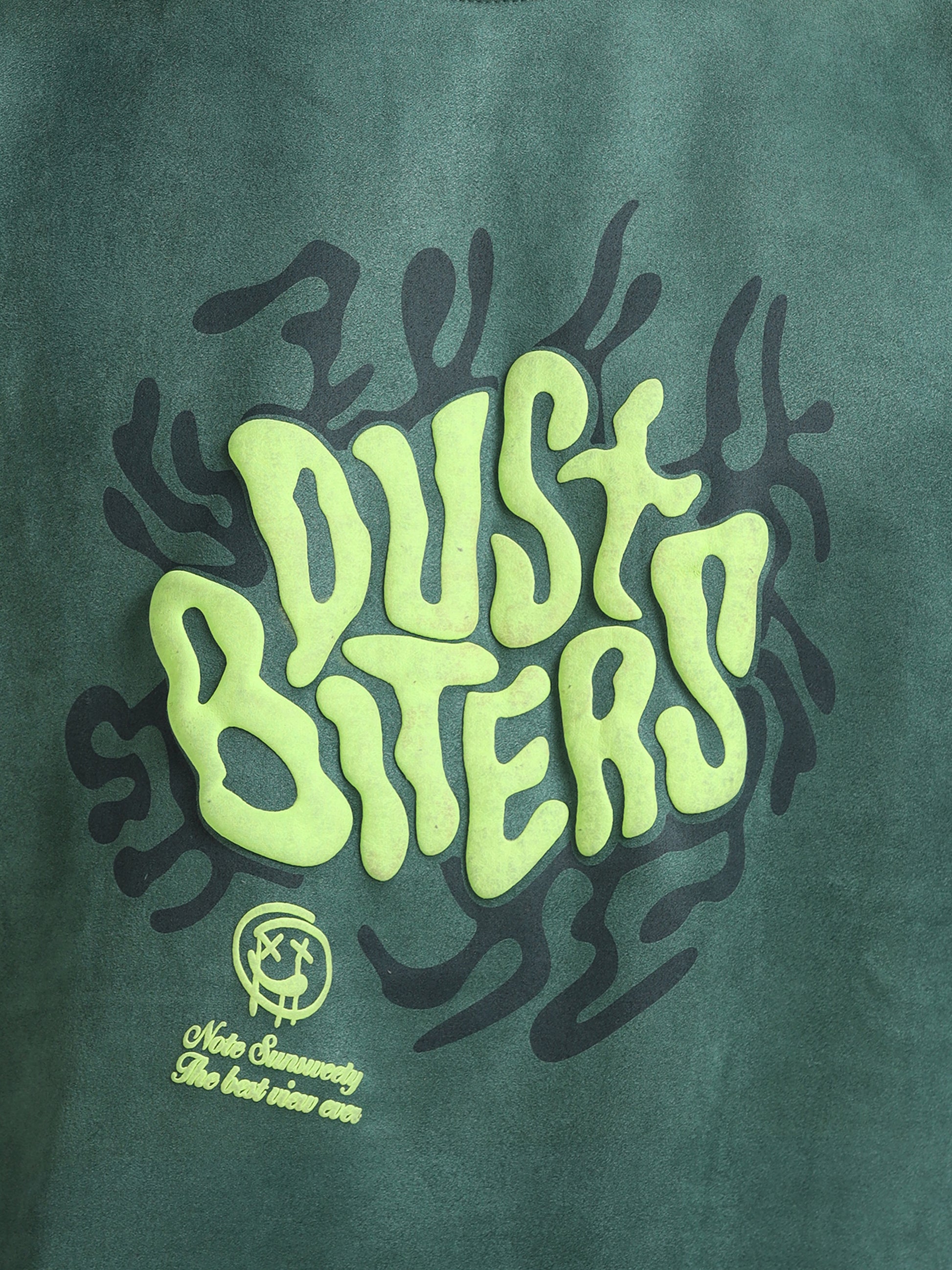 Soft-touch velvet fabric texture of the Green Puff Print Casual T-shirt in detail