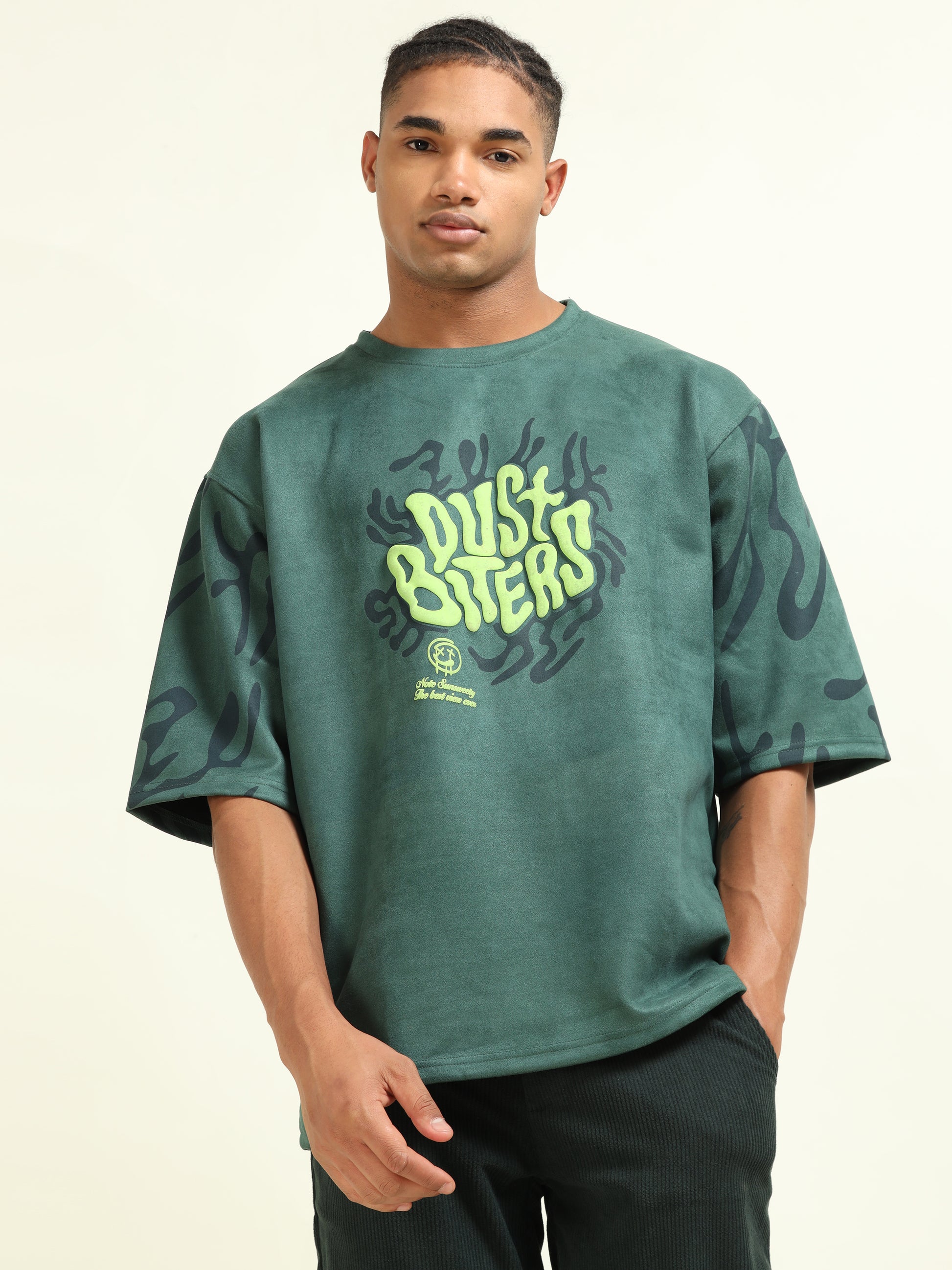 Back view of a model in the Green Puff Print Casual T-shirt, emphasizing the oversized style